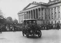 Automobile in front of the Treasury Building during the Woman Suffrage Parade