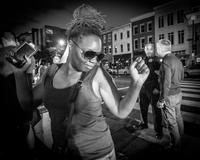 Protester dances at a Don't Mute D. C. protest